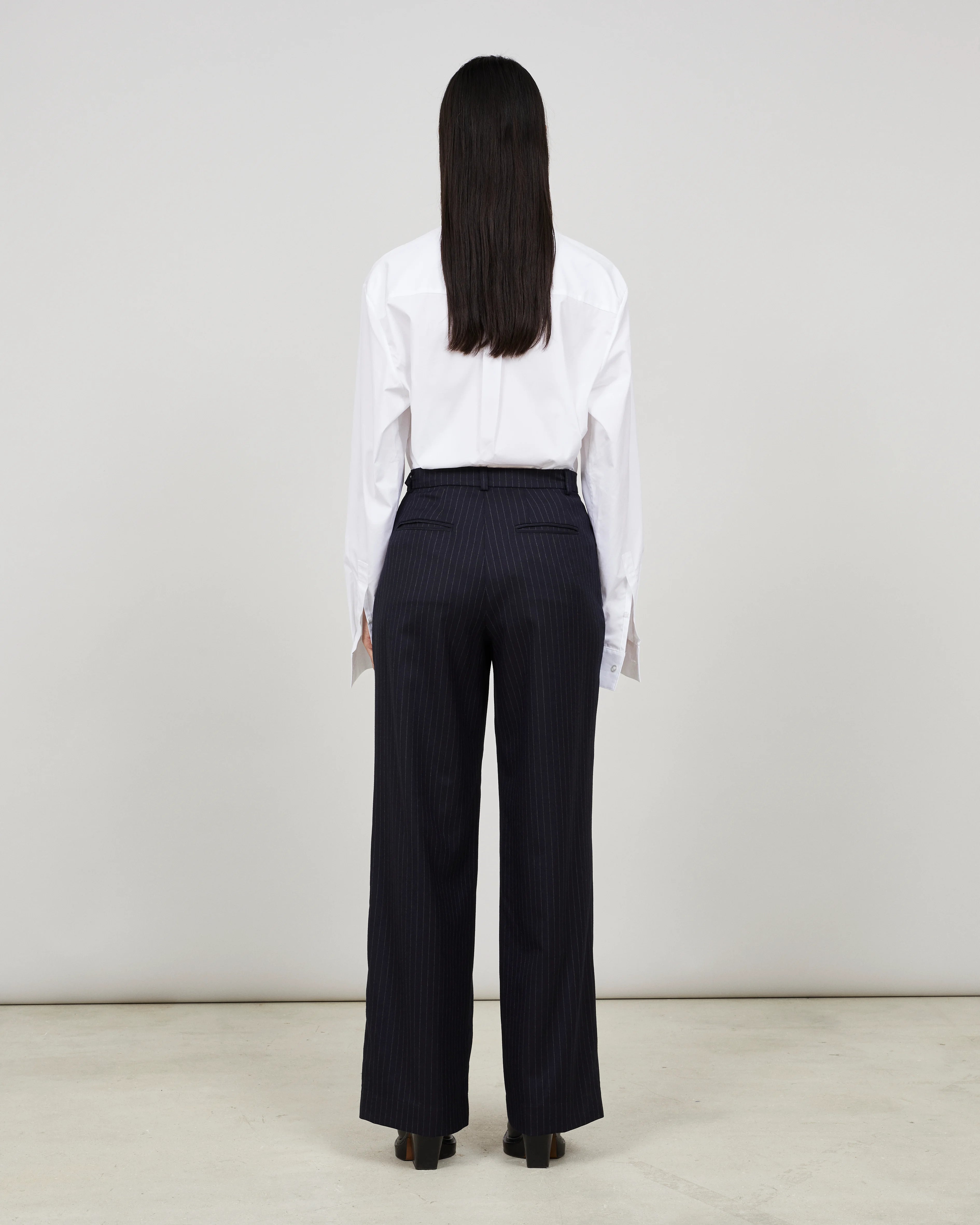 SOUTH - Wide-leg pleated trouser in pinstriped flannel