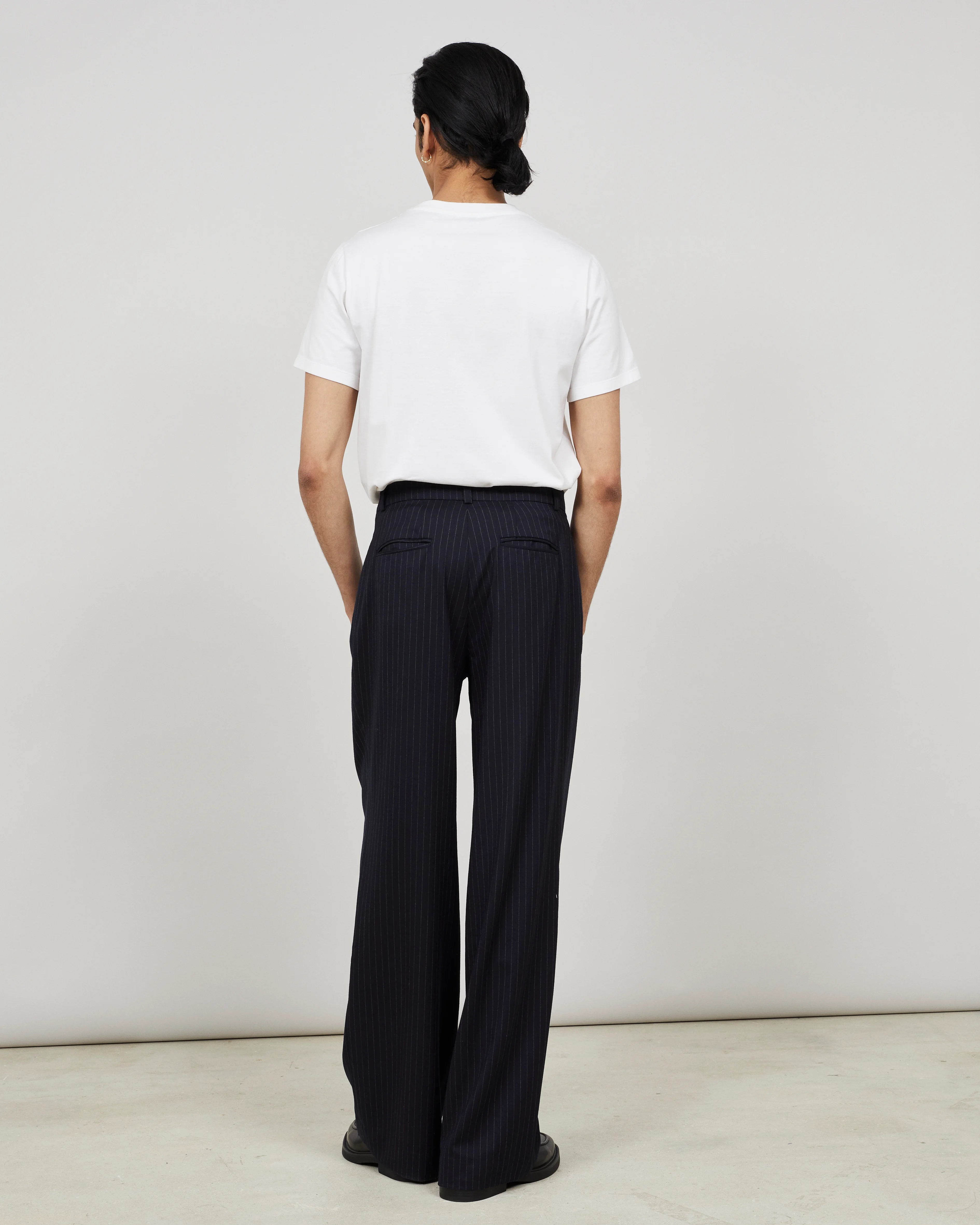 SOUTH - Wide-leg pleated trouser in pinstriped flannel