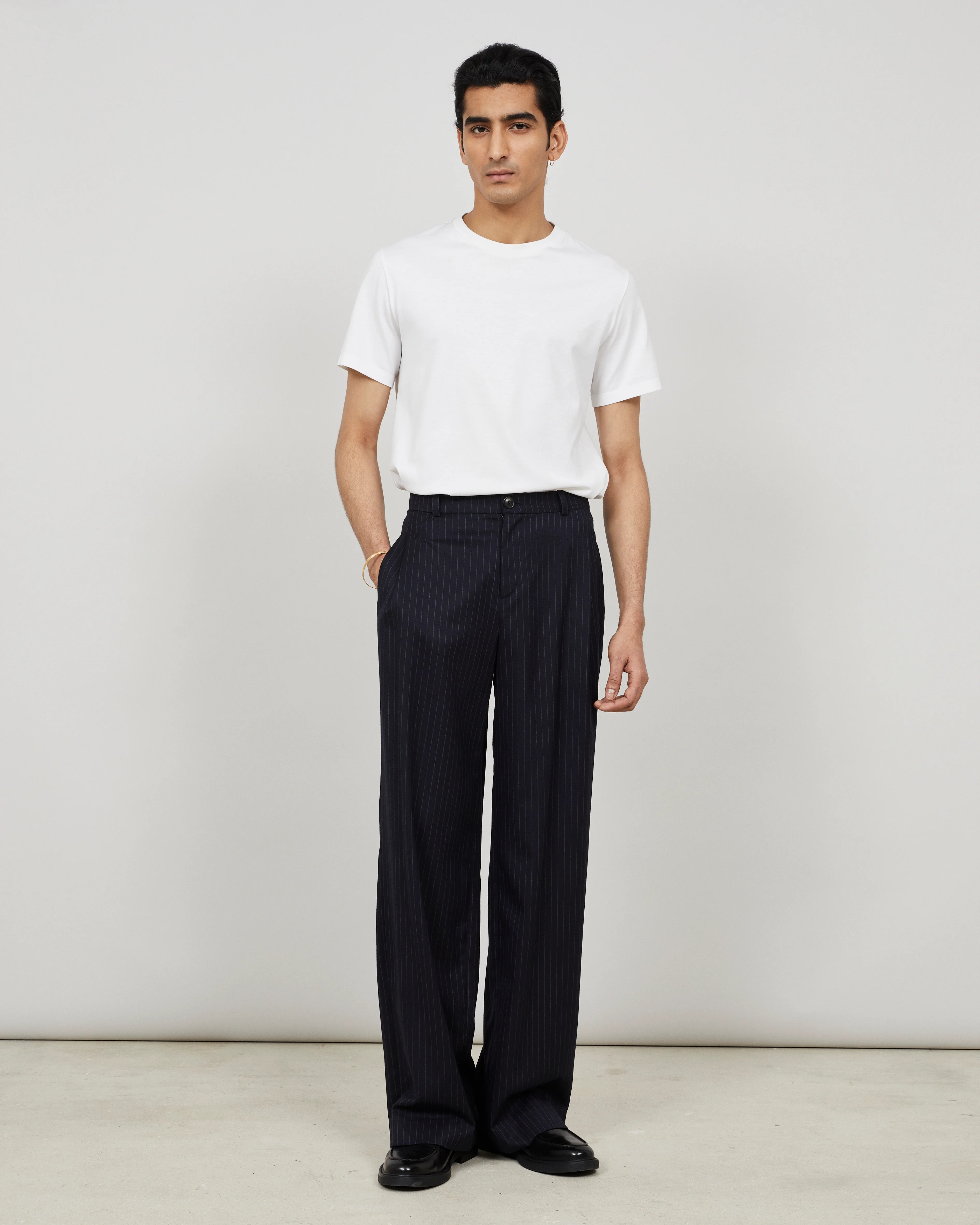 SOUTH - Wide-leg pleated trouser in pinstriped flannel